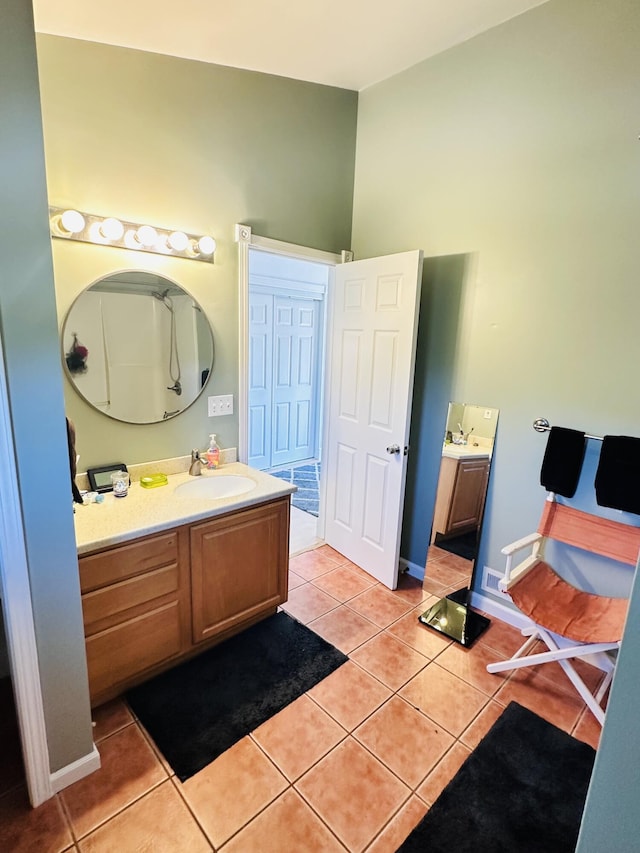 2540 Forrester Rd, Frankfort, MI 49635 - full bathroom featuring vanity and tile patterned floors
