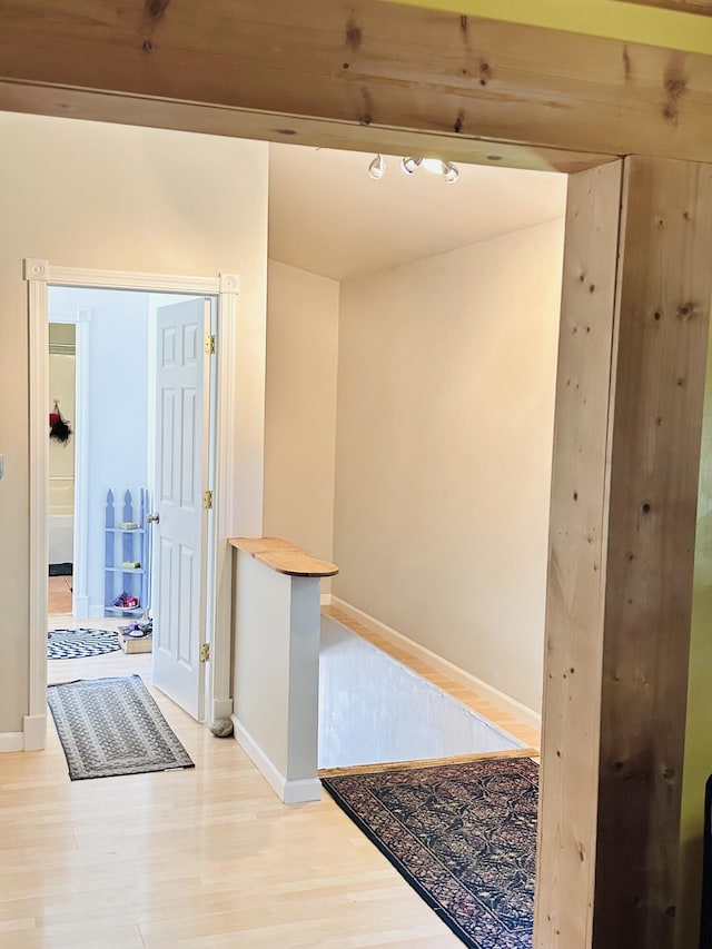 2540 Forrester Rd, Frankfort, MI 49635 - corridor featuring light wood-style floors and baseboards