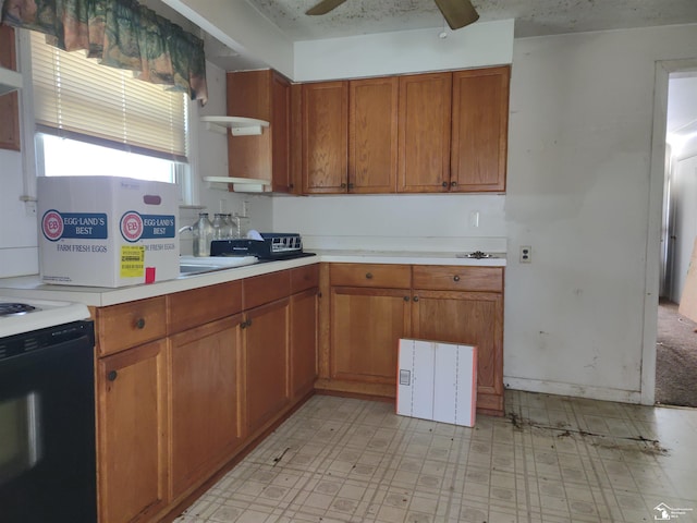 11352 Zeigler St, Taylor, MI 48180 - kitchen featuring light flooring, brown cabinetry, open shelves, light countertops, and ceiling fan