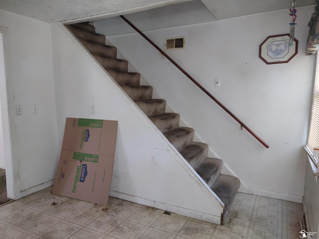11352 Zeigler St, Taylor, MI 48180 - stairway featuring tile patterned floors