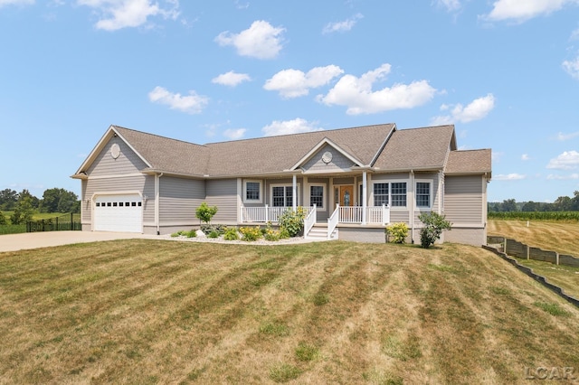 5726 Wolf Creek Hwy, Adrian, MI 49221 - view of front of home with a porch, concrete driveway, an attached garage, and roof with shingles