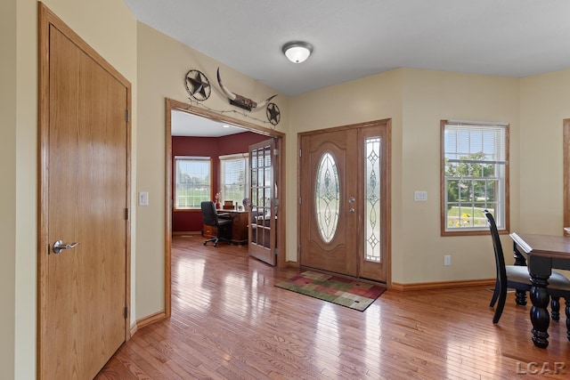 5726 Wolf Creek Hwy, Adrian, MI 49221 - foyer with healthy amount of natural light and light wood finished floors