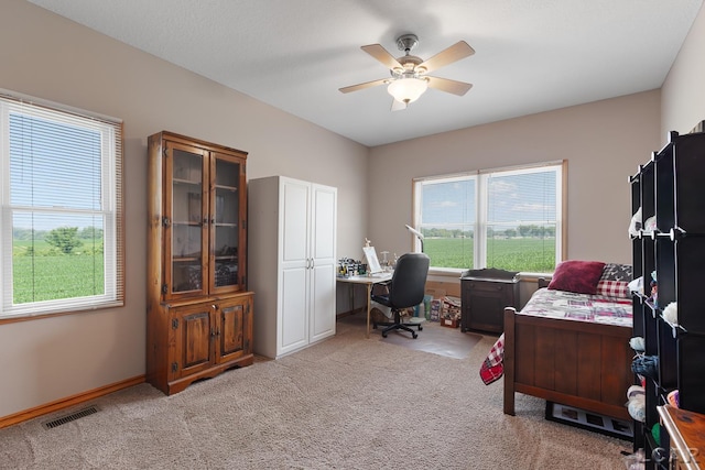 5726 Wolf Creek Hwy, Adrian, MI 49221 - bedroom featuring light carpet, an office area, and ceiling fan