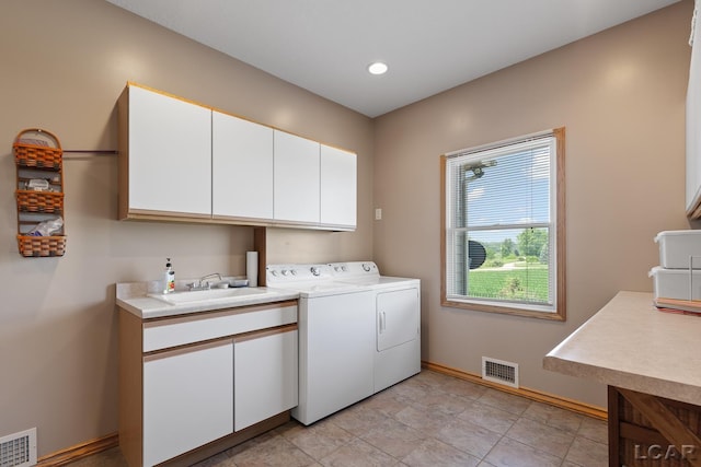 5726 Wolf Creek Hwy, Adrian, MI 49221 - laundry room featuring cabinet space, washing machine and dryer, and recessed lighting