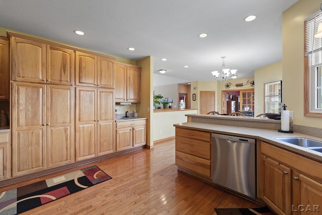 5726 Wolf Creek Hwy, Adrian, MI 49221 - kitchen featuring a chandelier, dishwasher, wood finished floors, recessed lighting, and light countertops