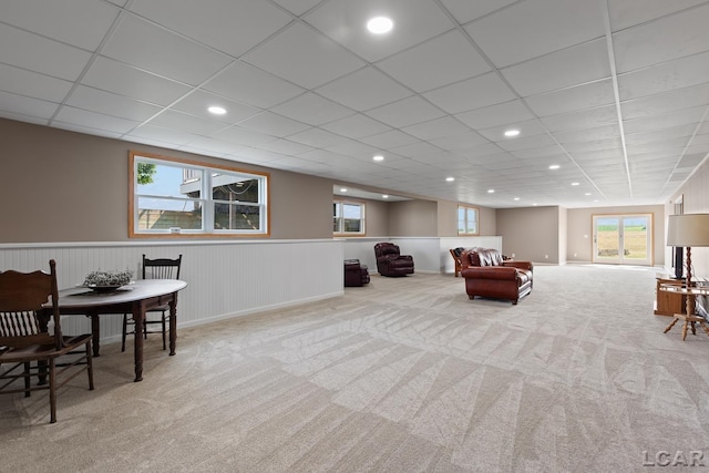 5726 Wolf Creek Hwy, Adrian, MI 49221 - living area with carpet floors, a wainscoted wall, a paneled ceiling, and recessed lighting