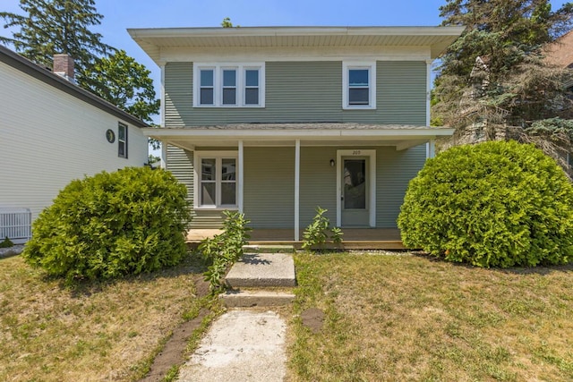 209 E Chapin St, Cadillac, MI 49601 - photo 1
