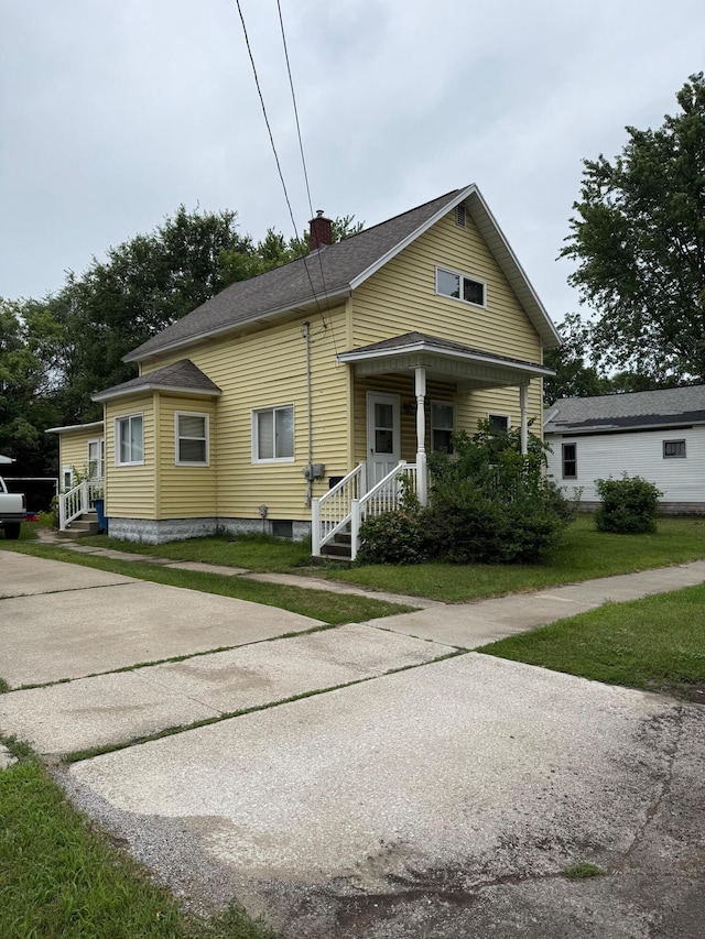 704 Engelman St, Manistee, MI 49660 - photo 1