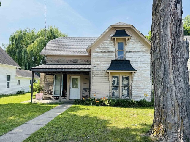 213 N Pine St, Lake City, MI 49651 - photo 1