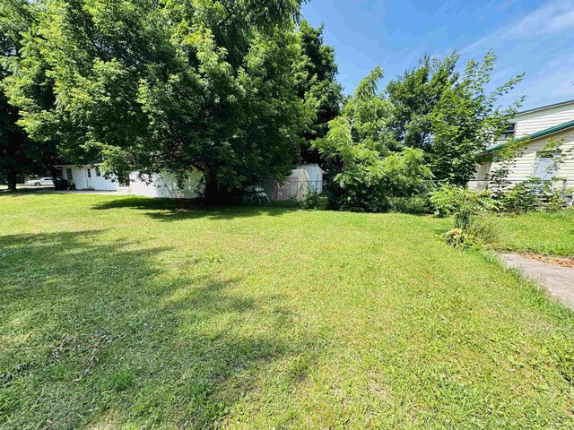 213 N Pine St, Lake City, MI 49651 - photo 7