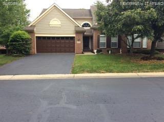 1533 Covington Xing Unit 16, Commerce Twp, MI 48390 - photo 1