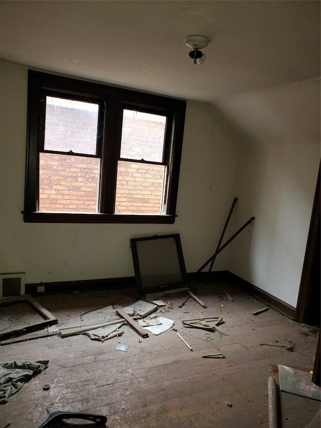 3226 Columbus St, Detroit, MI 48206 - bonus room featuring baseboards and lofted ceiling