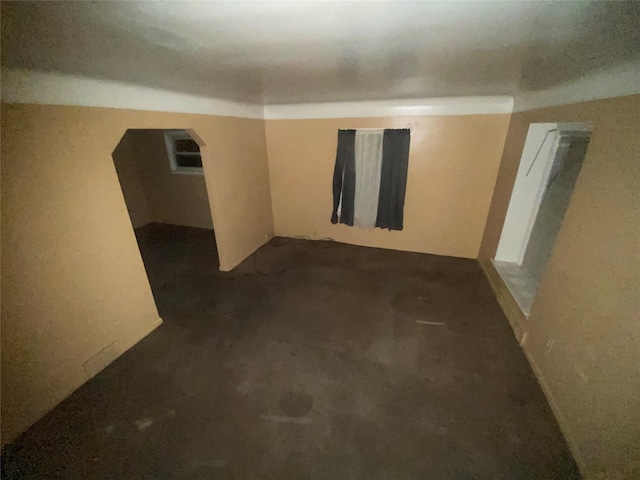 18905 Evergreen Rd, Detroit, MI 48219 - corridor featuring arched walkways and dark carpet
