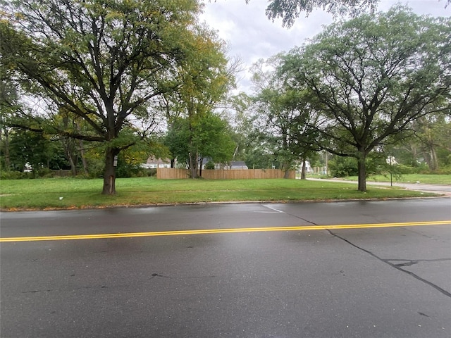 18905 Evergreen Rd, Detroit, MI 48219 - view of asphalt road with curbs