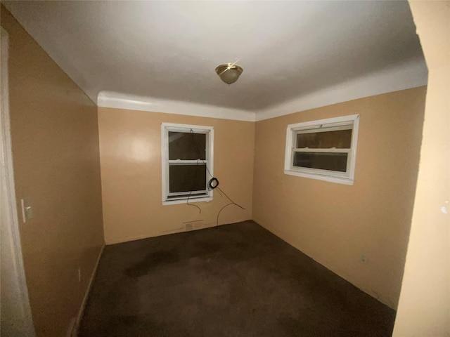 18905 Evergreen Rd, Detroit, MI 48219 - unfurnished room featuring dark carpet
