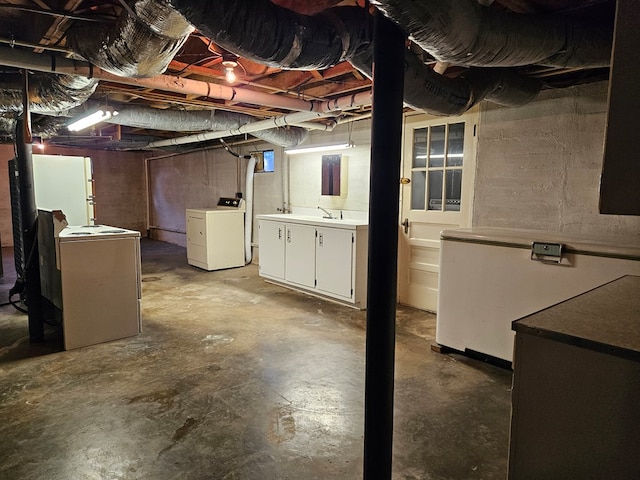 basement featuring separate washer and dryer