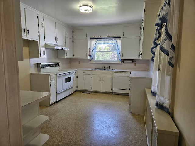 kitchen featuring white cabinetry, sink, and white appliances