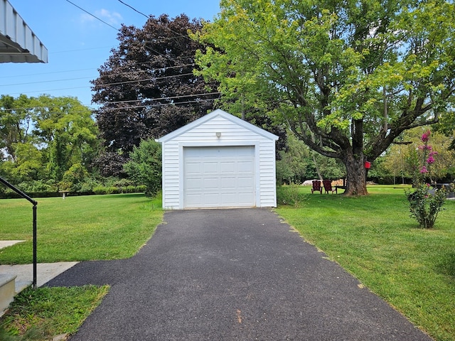 garage with a lawn