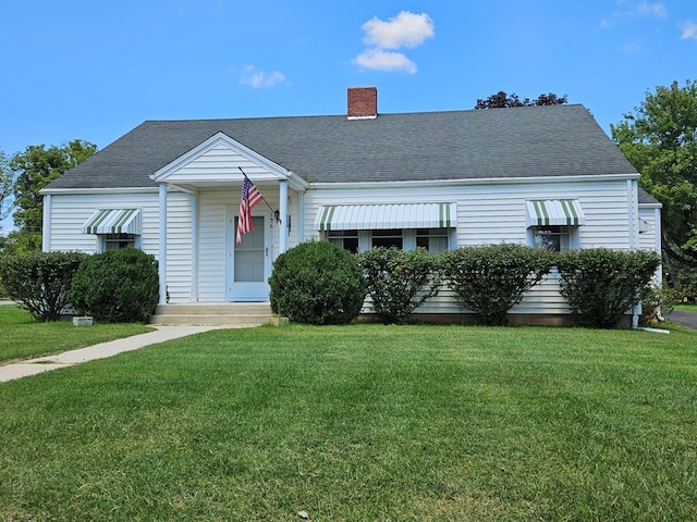 view of front of house with a front lawn