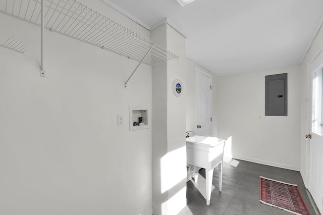 laundry room featuring electric panel and hookup for a washing machine