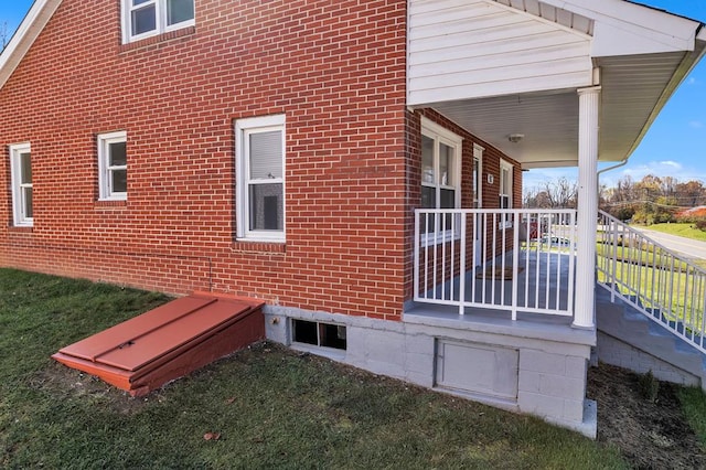 view of home's exterior featuring covered porch