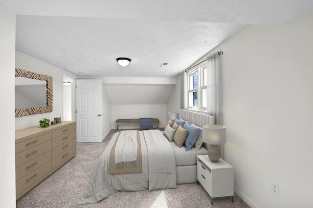 carpeted bedroom featuring lofted ceiling