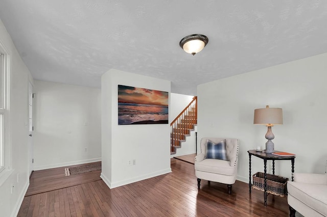 sitting room with hardwood / wood-style floors