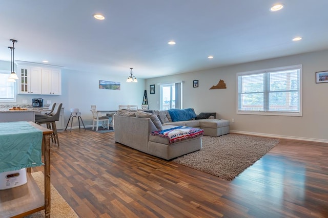 living room featuring dark wood-type flooring