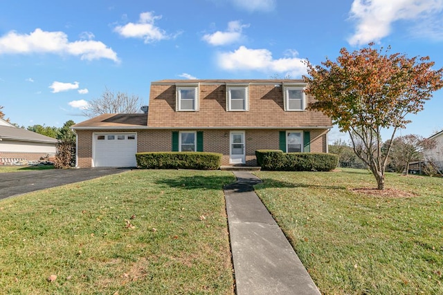 view of front of home with brick siding, a garage, aphalt driveway, and a front lawn