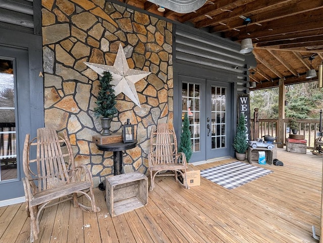 wooden deck featuring french doors