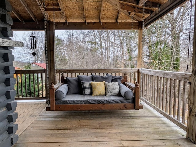 wooden deck with outdoor lounge area