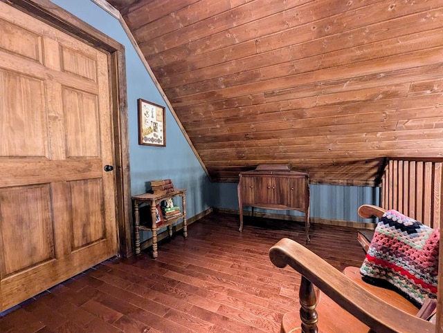 bedroom featuring vaulted ceiling, dark wood-type flooring, wooden ceiling, and baseboards