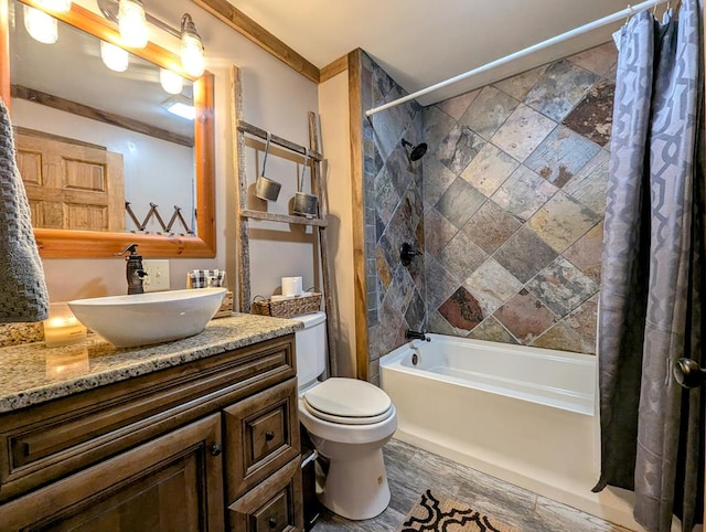 full bathroom with ornamental molding, vanity, toilet, and shower / bathtub combination with curtain