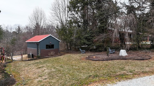 view of yard featuring an outbuilding and central AC unit