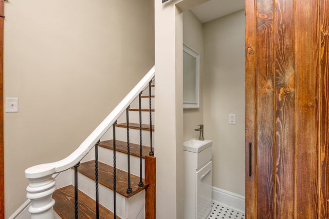 stairway with baseboards