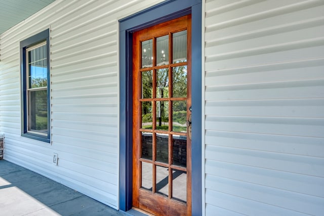 entrance to property with a porch