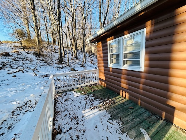 view of snow covered deck