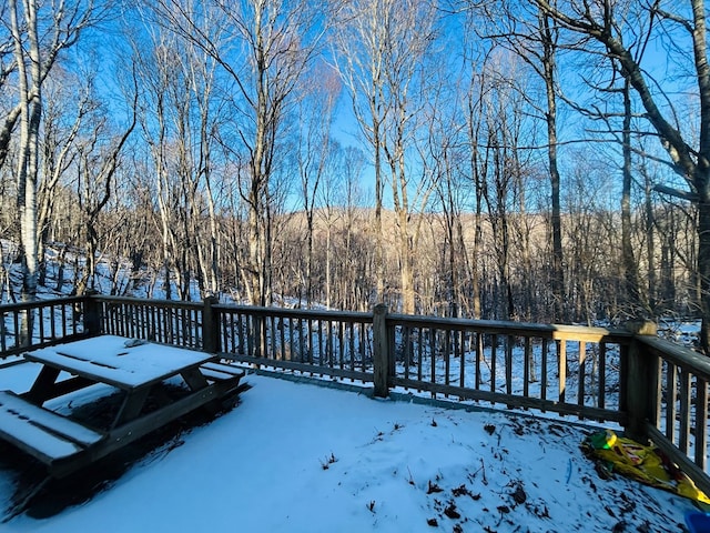 view of snow covered deck