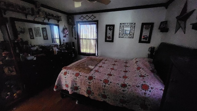 bedroom with ceiling fan and wood finished floors
