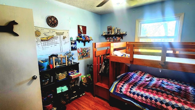 bedroom with wood finished floors