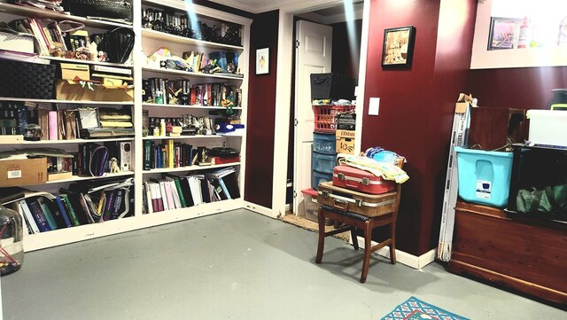 interior space featuring finished concrete floors