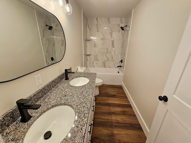 313 Fox Run Dr, Galax, VA 24333 - full bath featuring double vanity, wood finished floors, and shower / bathtub combination