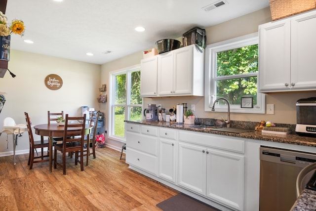 1048 Preston Dr, Radford, VA 24141 - kitchen featuring stainless steel dishwasher, light wood-style floors, recessed lighting, white cabinets, and dark stone counters