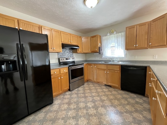 kitchen with black appliances, under cabinet range hood, a sink, and a textured ceiling