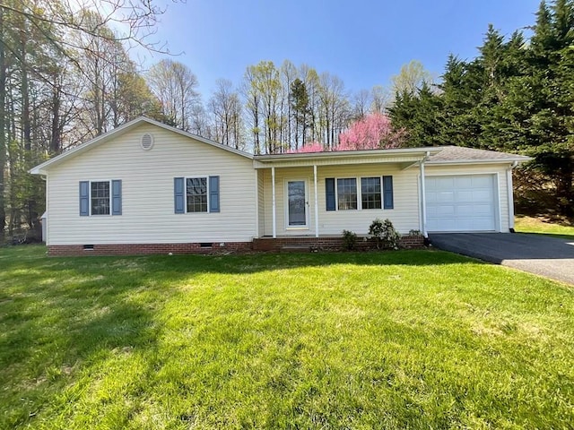 ranch-style house featuring an attached garage, crawl space, a front lawn, and aphalt driveway