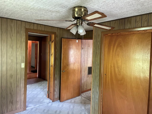 419 Adams St, Marion, VA 24354 - corridor with wood walls and carpet