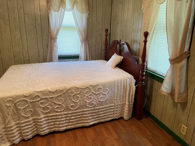 419 Adams St, Marion, VA 24354 - bedroom featuring wooden walls and wood finished floors