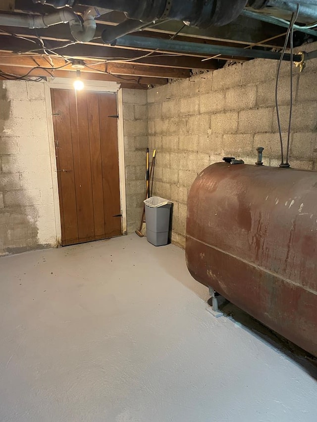 419 Adams St, Marion, VA 24354 - unfinished below grade area featuring oil tank