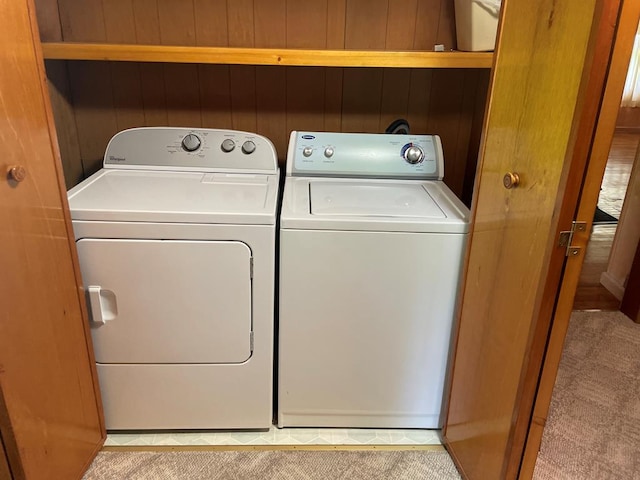 419 Adams St, Marion, VA 24354 - laundry room with washer and clothes dryer and wooden walls