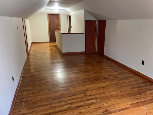 419 Adams St, Marion, VA 24354 - bonus room featuring wood-type flooring, vaulted ceiling, and baseboards